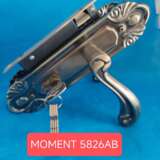 Moment door lock