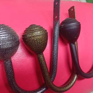 Powder-coated curtains holder