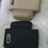 Car armrest with tissue storage